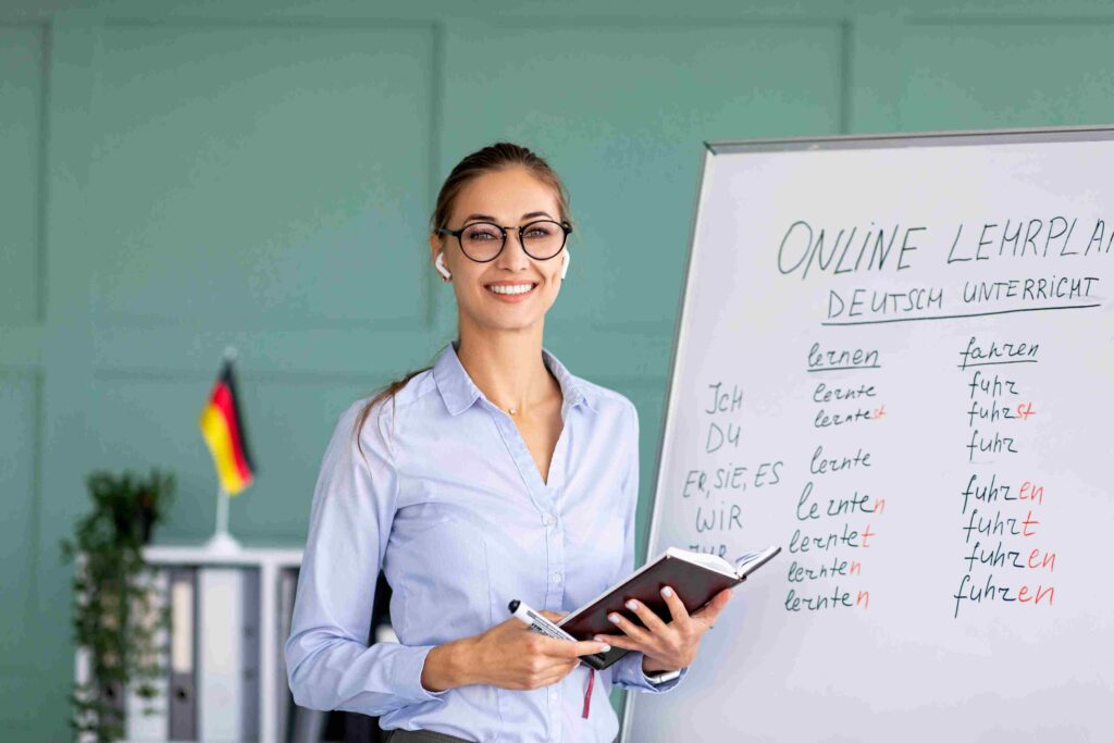 Deutschlehrerin bei einem Online-Kurs, unterstützt durch DIH PflegeDirekt für die sprachliche Ausbildung ausländischer Ergotherapeuten.